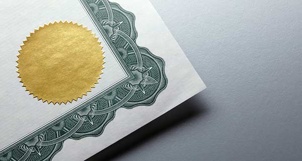 Image showing a pair of generic certificate-type documents.