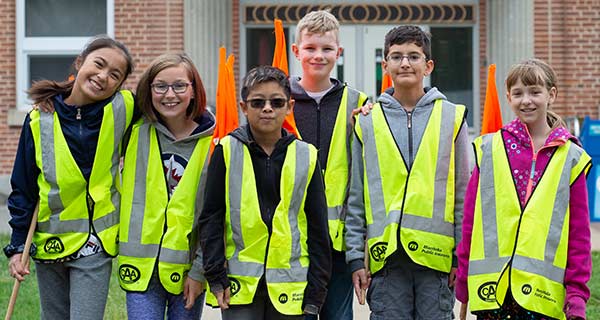 Image showing a group of young school patrollers facing the camera and smiling.